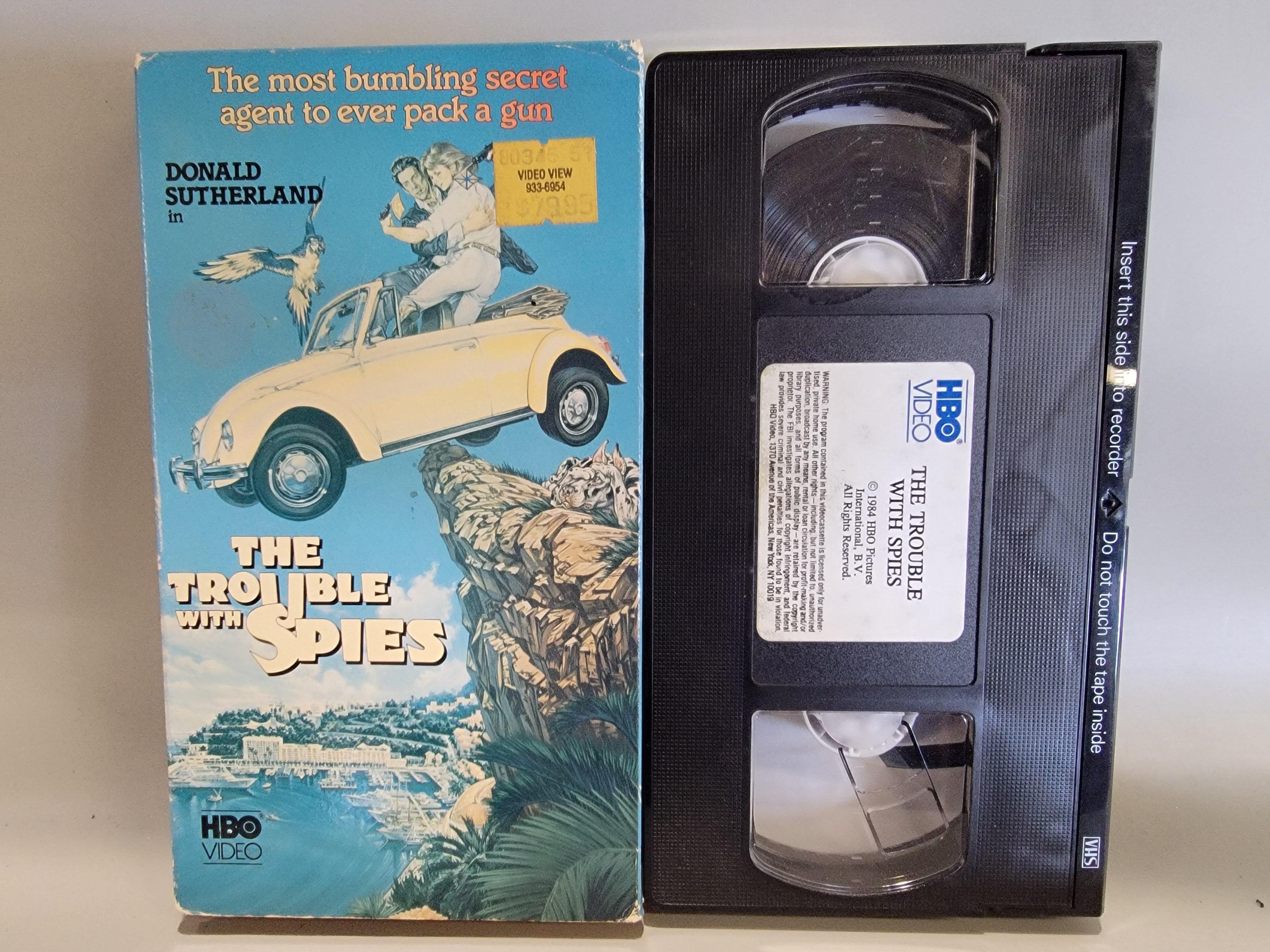 THE TROUBLE WITH SPIES VHS [USED]