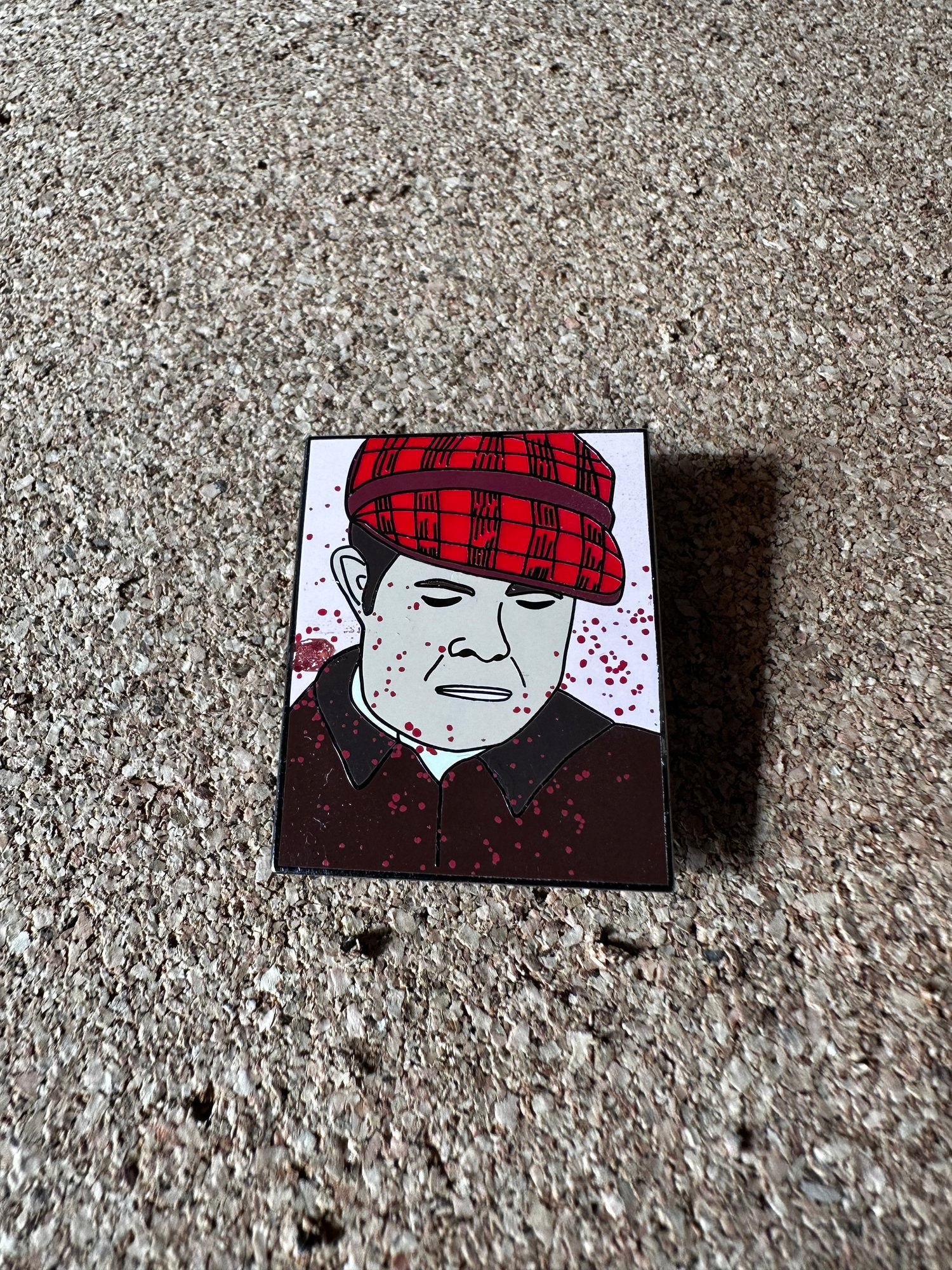 ED GEIN PAINTING ENAMEL PIN