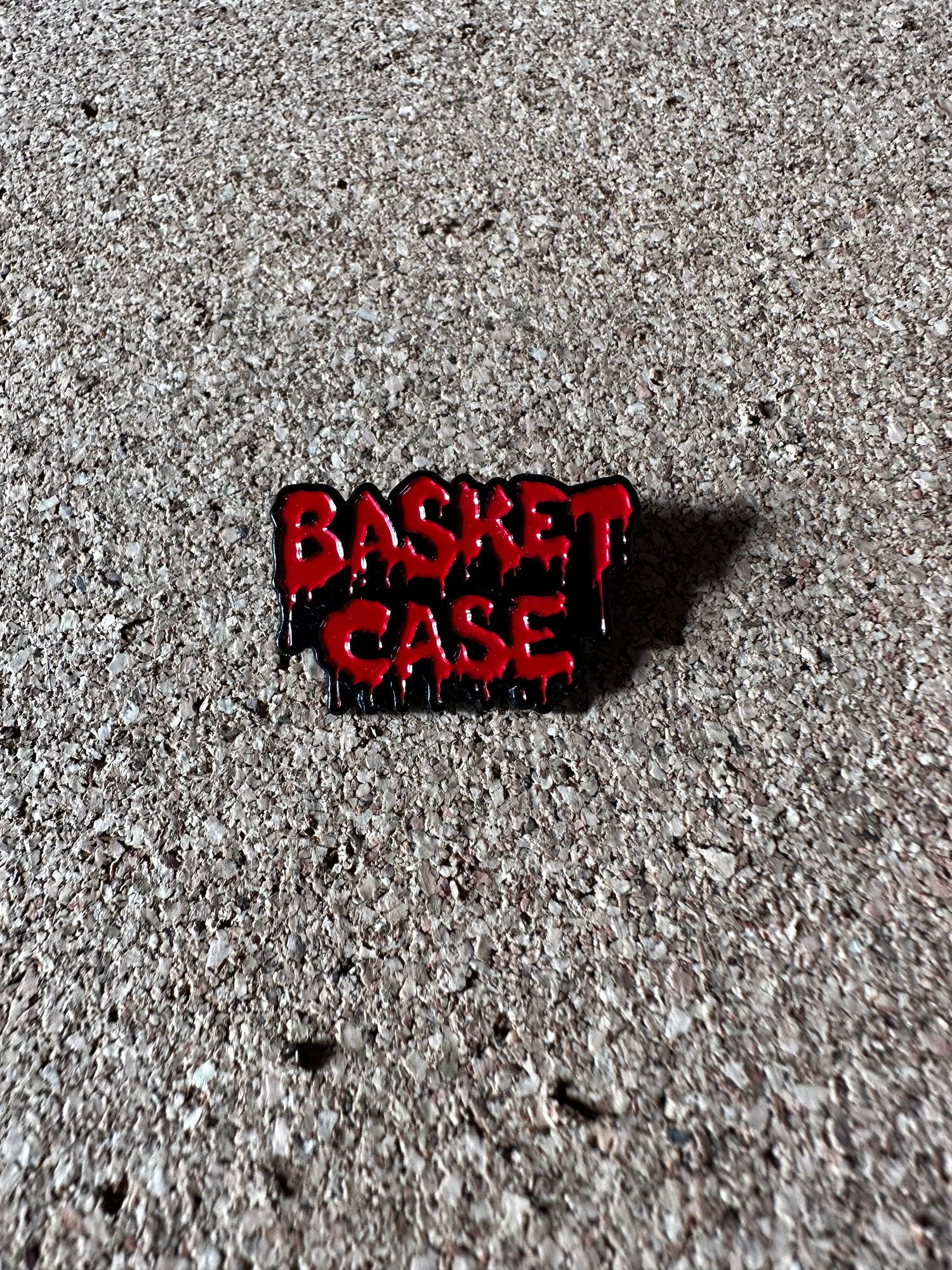 BASKET CASE LOGO ENAMEL PIN