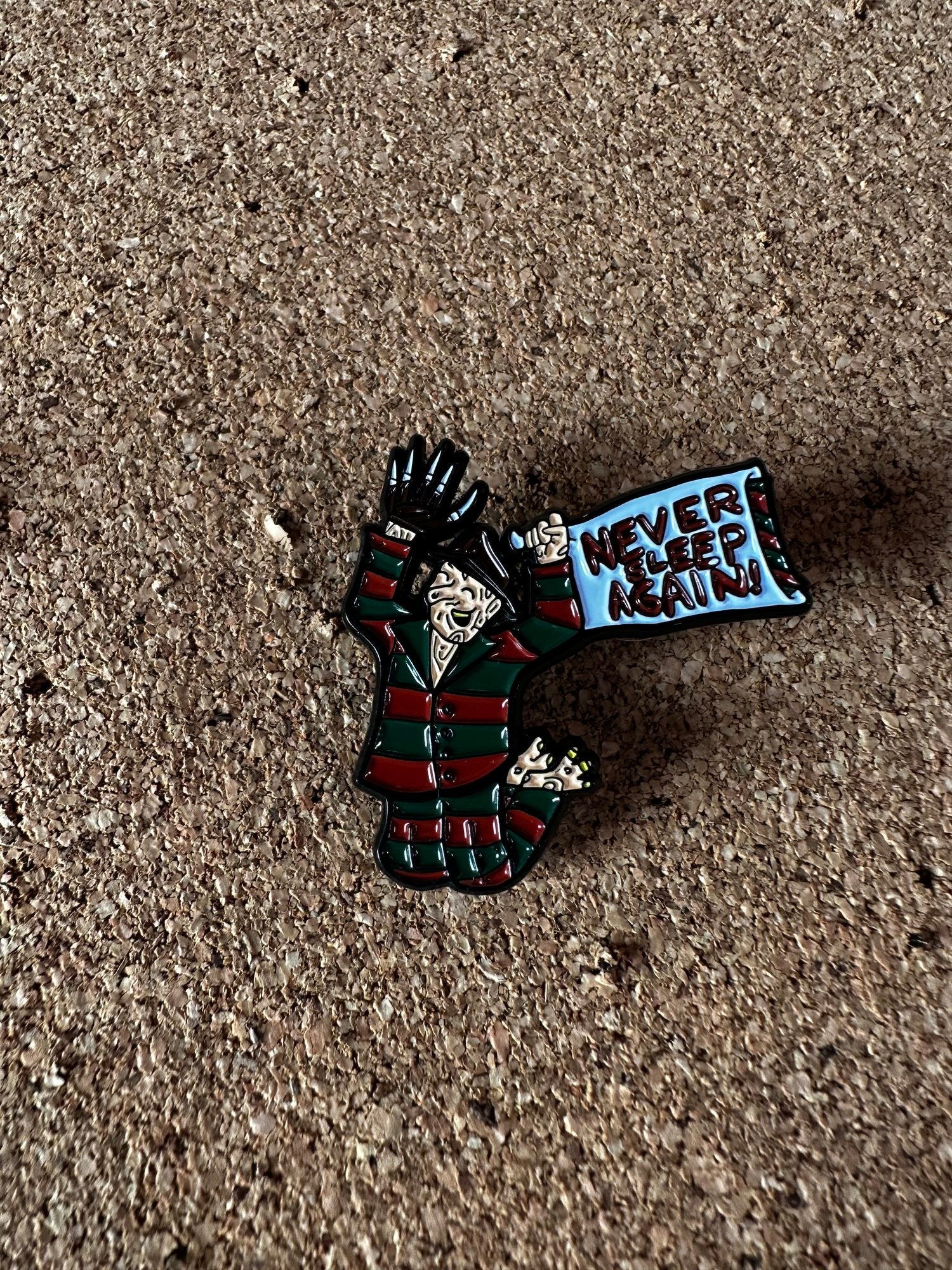 NEVER SLEEP AGAIN ENAMEL PIN