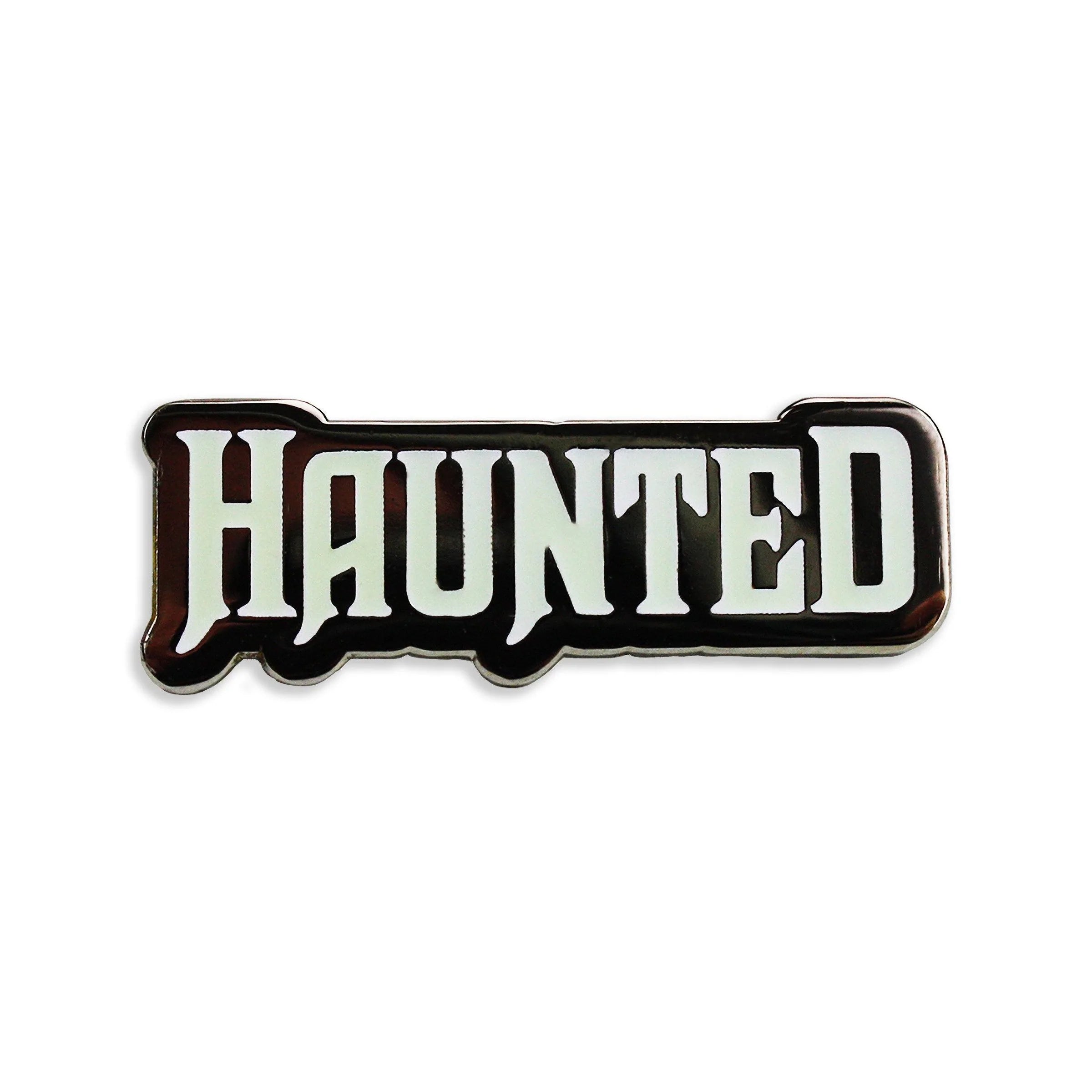 HAUNTED GLOW IN THE DARK ENAMEL PIN